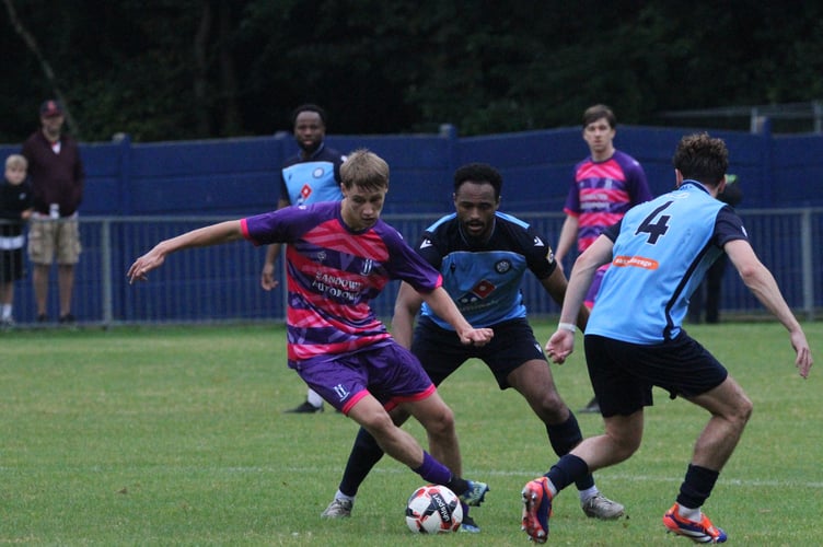 Action from Sheerwater's 3-0 defeat at Fleet Town (Photo: Dan Eicke)