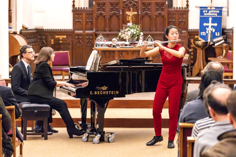 Hanhan Qu, winner of the Woking Young Musician 2024, playing the flute with Piano accompaniment by Margret Roberts