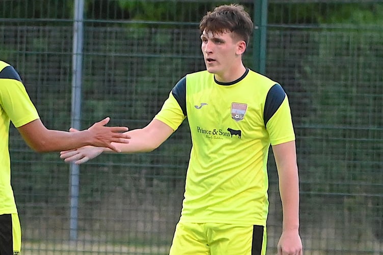 Knaphill's Ben Mitchell is congratulated