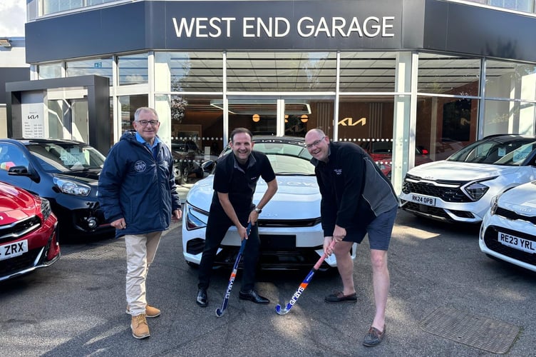 From left: Rob Pike, chairman of Woking Hockey Club; Andy Simpson, operations director of West End Garage; and Brendan Dunne, managing director of West End Garage.