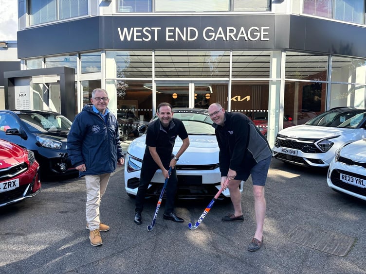 From left: Rob Pike, chairman of Woking Hockey Club; Andy Simpson, operations director of West End Garage; and Brendan Dunne, managing director of West End Garage.
