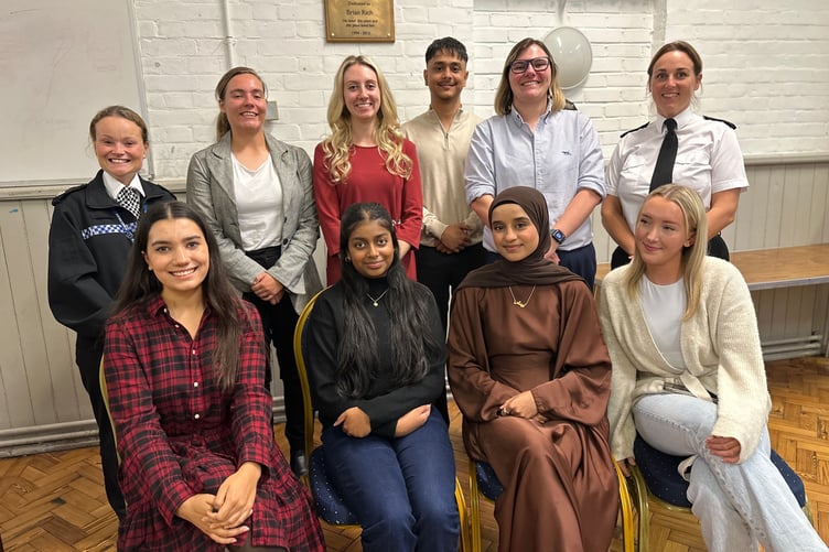 Members of the Surrey Youth Commission stand with Deputy Police and Crime Commissioner Ellie Vesey-Thompson and Surrey Police officers