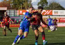 Woking slip to National League defeat at Tamworth in end-to-end contest