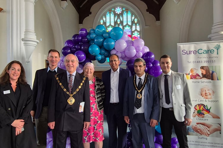 Left to right: Cllr Jane Auston, MP Jeremy Hunt, Waverley mayor Cllr John Ward, Joanna Mackenzie, a service user, Shahid Younis, Managing Director of SureCare Guildford & Woking, Cllr. Saj Hussain, Surrey County Council chairman and Imran Shabir, SureCare Business Development Manager 
