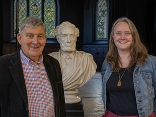 Bisley or bust: surprise guest joins anniversary party at village hall