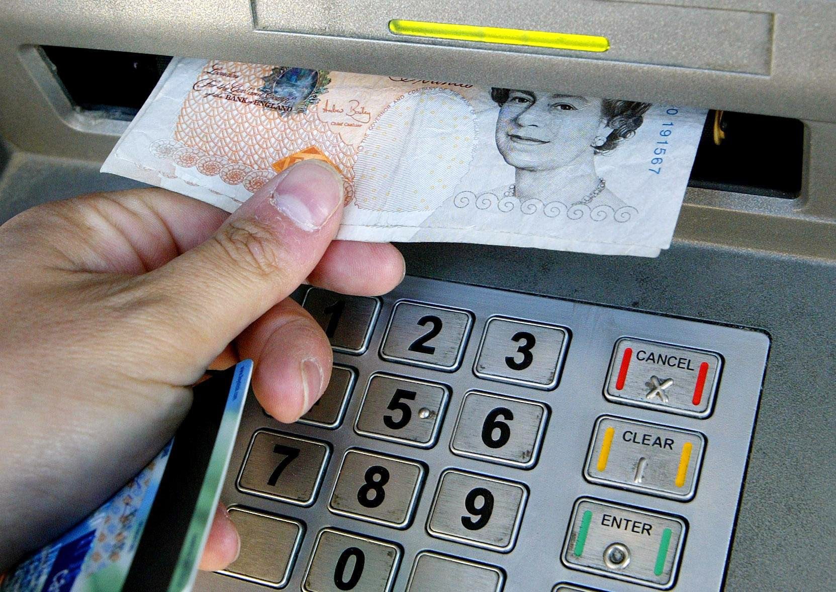 Fewer ATMs in Woking since 2021