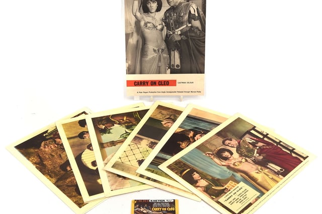 Collection of saucy Carry On posters up for sale at Surrey auctioneers