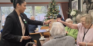 University students spread festive cheer at local care home