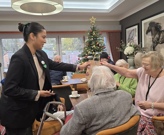 University students spread festive cheer at local care home