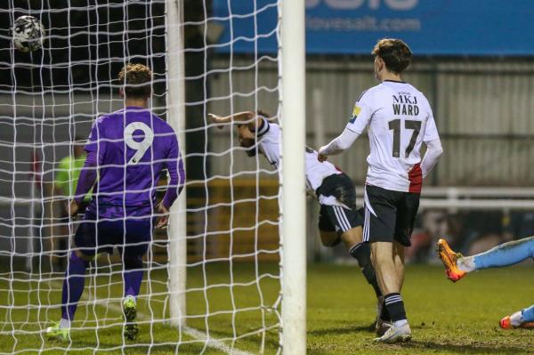 Dion Kelly-Evans heads Woking into a 2-1 lead against Fulham under-21s, December 3rd 2024.