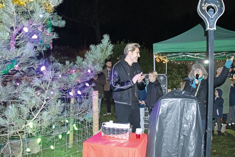 Parish councillor Emma Kennedy led the cheers after Charlie Simpson switched on the tree lights