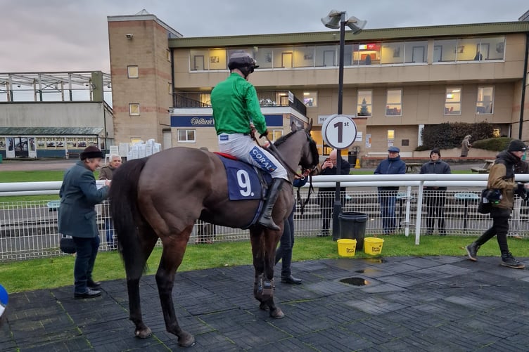Trainer Henrietta Knight, jockey Brendan Powell and horse Motazzen in the winners enclosure at Fontwell (Photo: Peter Moore)