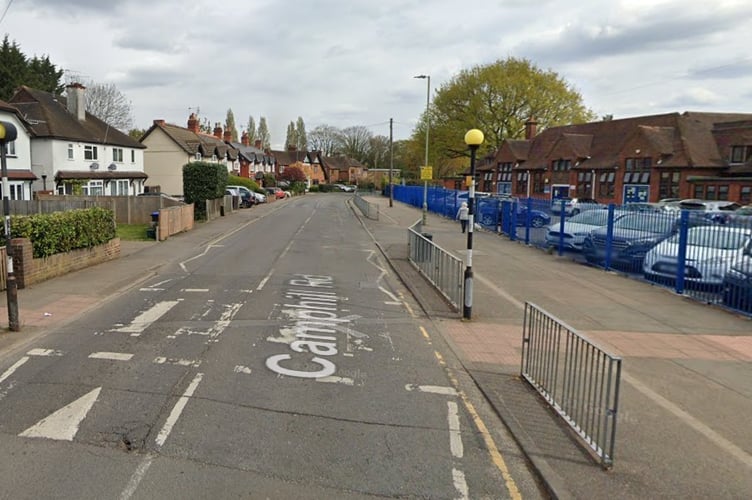 View down Camphill Road, with West Byfleet Junior School 