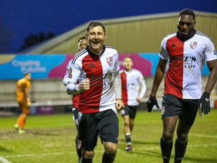 Woking held to draw by Halifax after conceding late equaliser