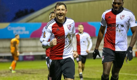Woking held to draw by Halifax after conceding late equaliser