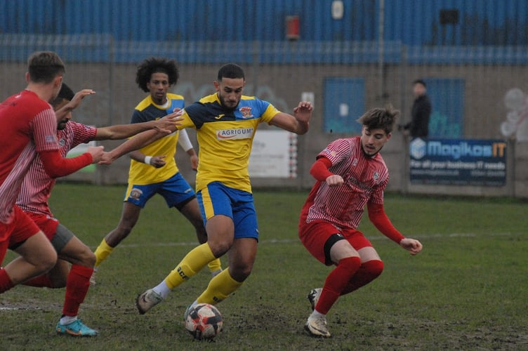 Qasim Khan gives Guildford City the lead at Camberley Town (Photo: Chris Pegman)