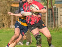Woking lose top-of-the-table clash against leaders