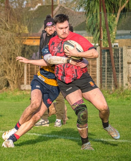Woking's Charlie Goddard carries the ball (Photo: Justin Cliffe)