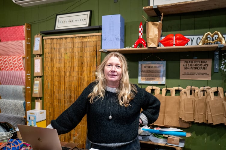 Inge Dunbar owner of Sass & Spirit, Haslemere, that has seen a raise in shop lifting and shop thefts, Haslemere, Surrey, 23rd January 2025 . Photo released January 27 2025. Fed up business owners in a market town have launched a vigilante WhatsApp group - after a rise in "well-off middle-aged" shoplifters. Traders in Haslemere, Surrey say shoplifting has gotten so bad in recent months that messages are sent in the messaging group "every single day". Shop owners let each other know if they have been stolen from and share CCTV footage of criminals to look out for - with members aware of a few repeat perpetrators. They say the problem has been exacerbated by a "lack of police presence" in the town and insist that it is not linked to the cost of living crisis.