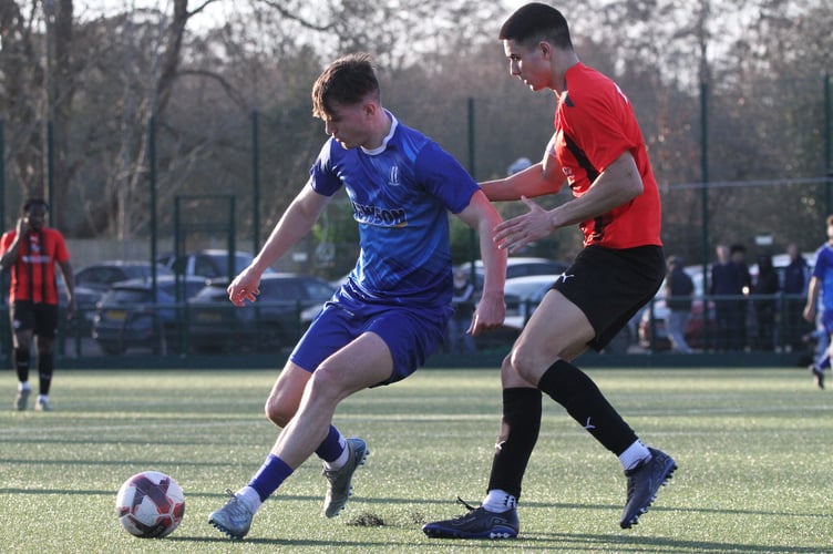 Action from Sheerwater's 4-0 defeat at Cobham (Photo: Dan Eicke)