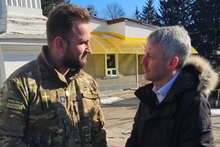 Will Forster, MP for Woking, meets with a member of the Ukraine military on a cross-party delegation to the country.