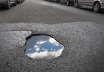 Five Surrey crumbling roads might not be fixed until 2028, residents told