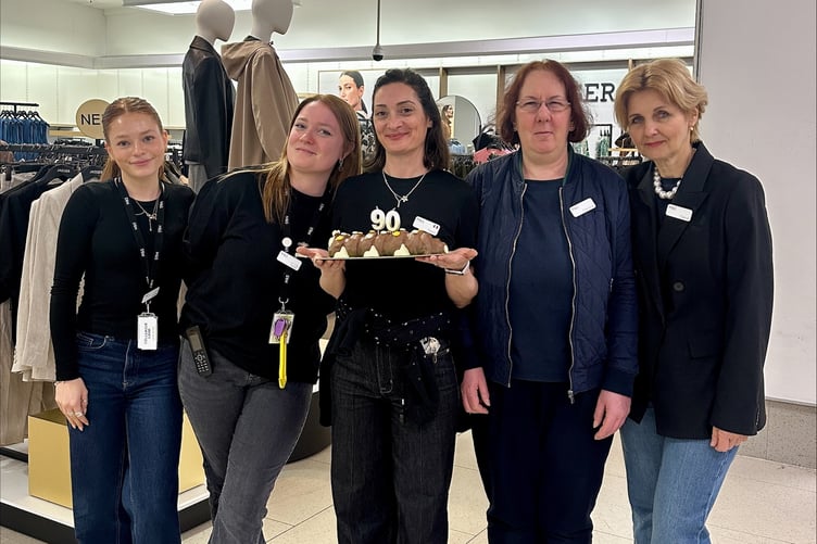 M&S Guilford’s clothing and home deputy manager Poppy Holwill and team celebrate the store's 90 years of trading.