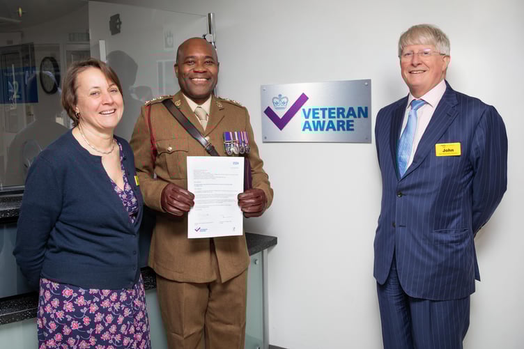 Left to right: Louise Stead (group chief executive of Ashford and St Peter’s Hospitals and Royal Surrey), Capt Dr Clarence Chikusu RAMS and John Machin (acting chair)