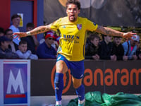 Cards beat Latics to boost survival hopes