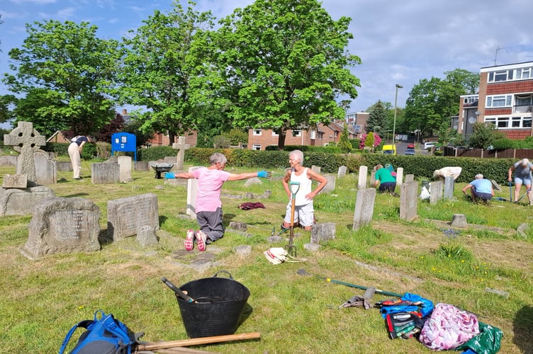 Tidying Commonwealth Graves in Horsell churchyard