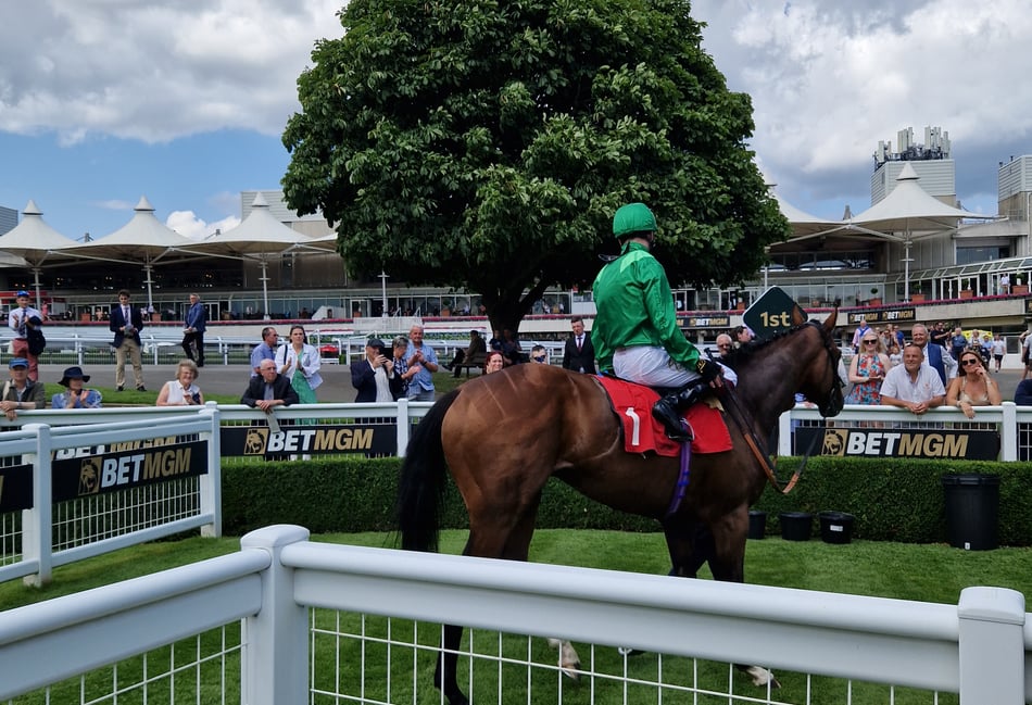 Jockey Colin Keane rides his first winner at Sandown Park