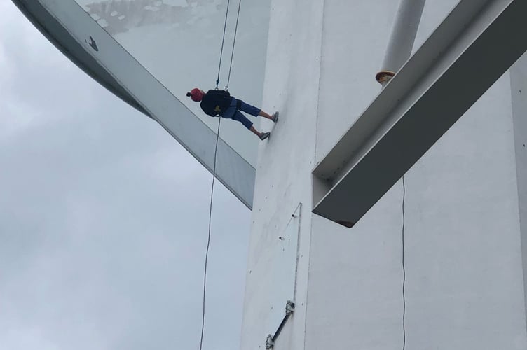 June Fenn abseils down the Spinnaker Tower at Gunwharf Quays in Portsmouth on June 15th 2025.