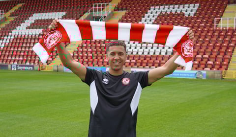 Cards sign left-sided defender
