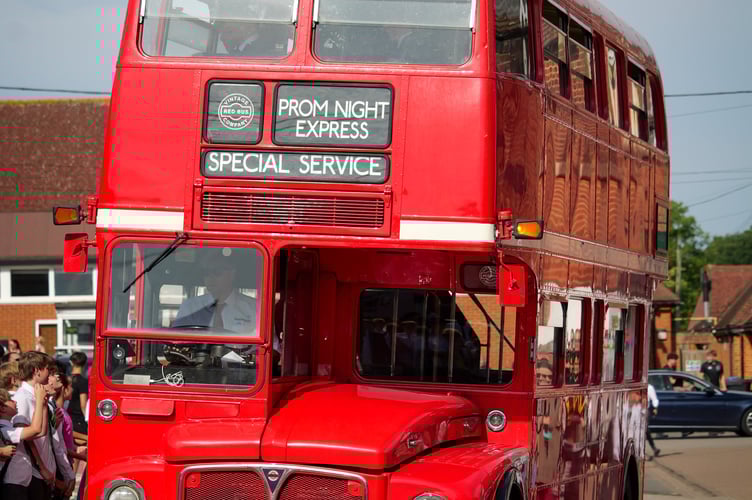 The Prom Night Express Special Service is the first vehicle to arrive, transporting a whole load of students