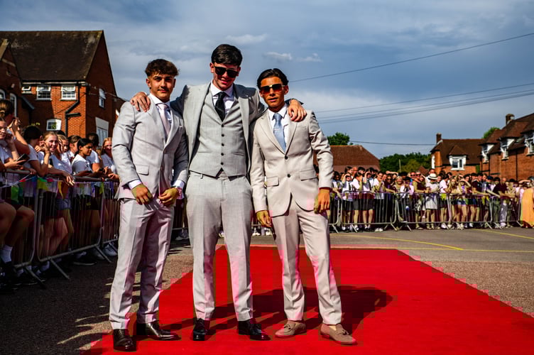 Looking sharp in matching grey suits - Bradley, Harry and Joshua