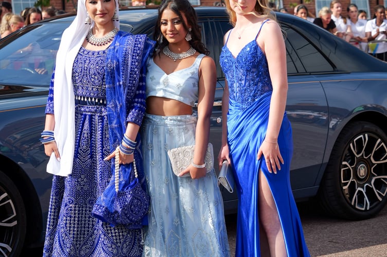 Glamorous in blue on the Parade Square for the start of their Prom, Jasmine Sinclair, Arianna Chandegra and Katie Higgins