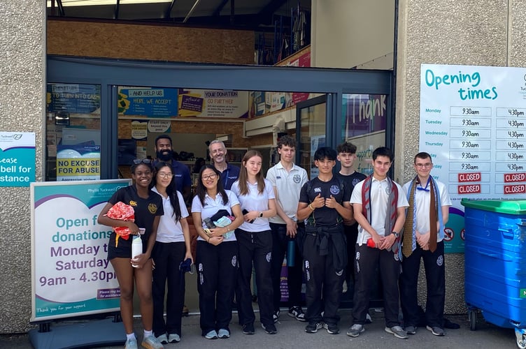 Students sorted through 50 bin bags of donations and 200kg of books for the Phyllis Tuckwell Hospice charity shop