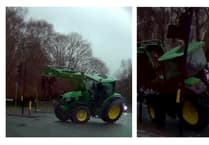 John Deerey me: Millions watch tractor take Knaphill corner on two wheels