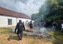 Firewalkers beat heat in charity fundraiser