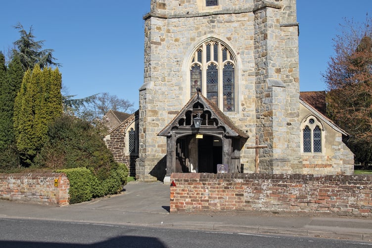 The 17th-century brick wall surrounding St Lawrence Church in Chobham, now set for repairs funded by Surrey Heath Borough Council following a review of historic maintenance responsibilities