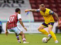 Woking fall to National League defeat at Scunthorpe United