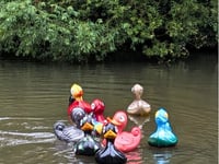 Quacking fun as River Wey duck race raises money for Surrey Care Trust