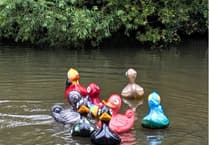 Quacking fun as River Wey duck race raises money for Surrey Care Trust