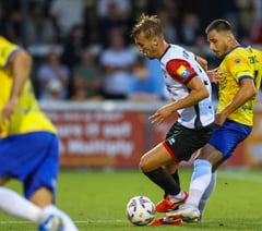 Woking beat Morecambe to claim first win of the season