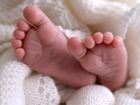 Fertility rate falls slightly in Woking – as it reaches new record low in England and Wales