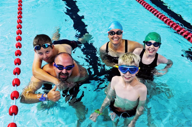Swimmers go the extra length for charity at the annual Woking Swimathon