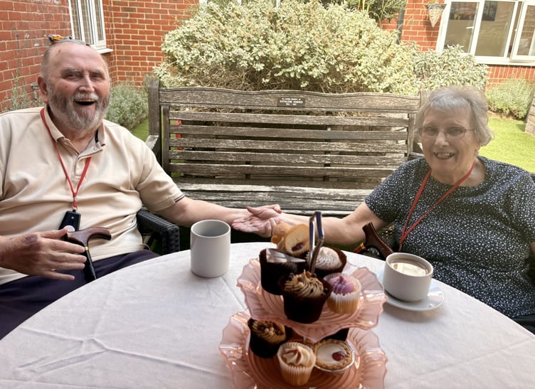 Geoff and Helen Harrold, residents at Bernard Sunley Care Home, having a great time celebrating Afternoon Tea Week together