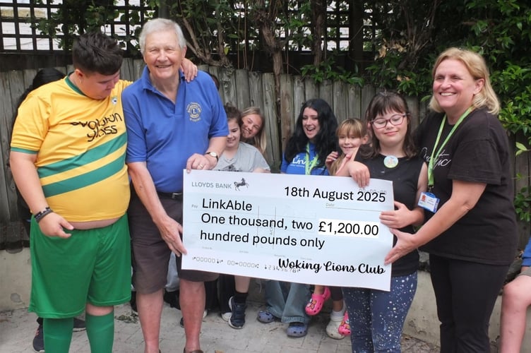 LinkAble cheque from Woking Lions