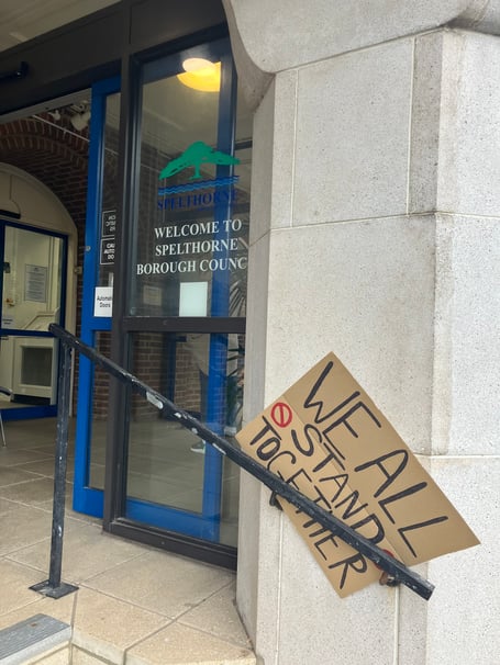 Protest sign outside Spelthorne Borough Council offices.