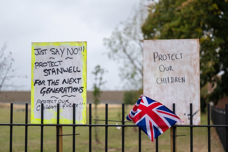 Protest banners opposite The Stanwell hotel that's being used to house migrants. Stanwell, Surrey. // Villagers have hit out at the government after a hotel was turned into asylum seeker accommodation â claiming they feel âintimidatedâ by single male migrants. The Stanwell Hotel near Heathrow initially closed its doors to the public in 2022 â after the Home Office announced plans to use the premises to house migrants. The move meant many locals lost their jobs and were forced to say goodbye to a beloved community premises â used for events like weddings, funerals, and Christmas and New Yearâs celebrations. Initially, the hotel housed families seeking asylum in the UK, who, according to residents, made an effort to integrate with the community and posed no issues.